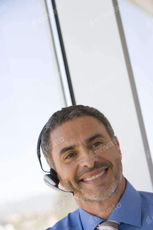 Preview: Businessman With Hands-Free Telephone Headset