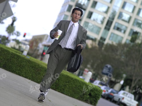 Preview: Businessman In Running Shoes With Bag And Coffee (Tilt)