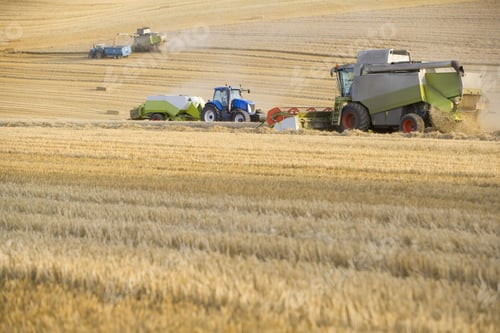 Preview: Combine Harvesting Wheat And Straw Baler In Field