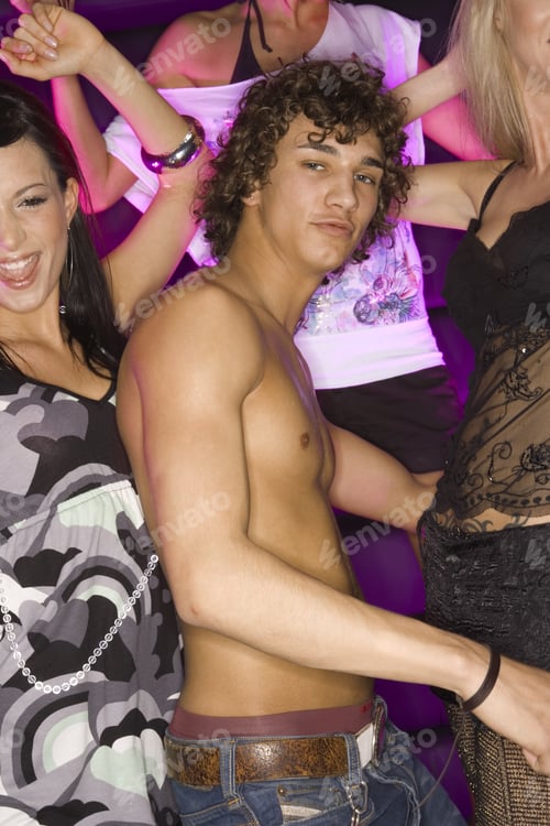 Preview: Portrait Of A Young Man Dancing With Three Young Women In A Nightclub