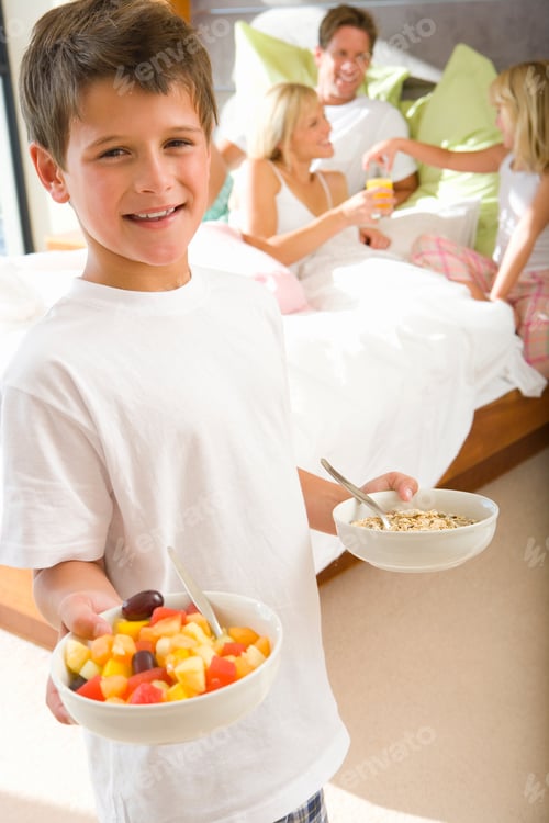 Preview: Boy Smiling with Fruit Salad and Cereal