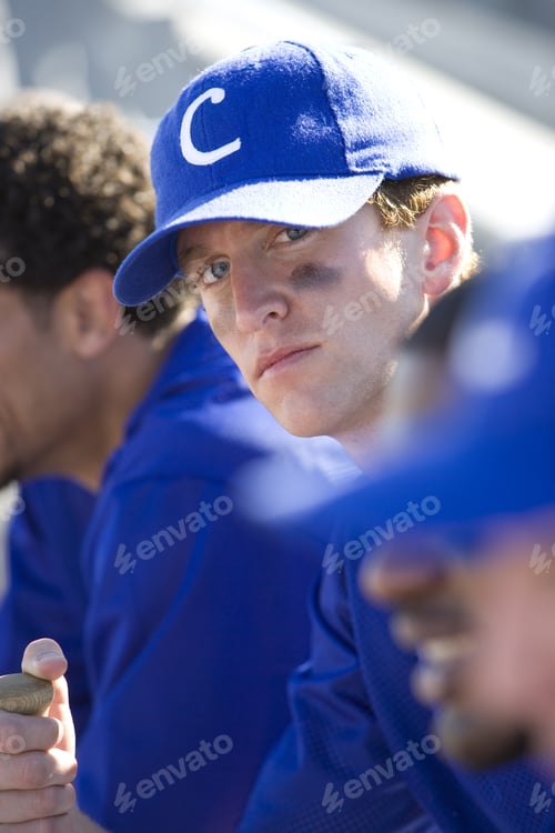 Preview: Baseball Team Sitting In Batterã?¢âÂ?‰Â?¢S Box During Competitive Baseball Game, Focus On