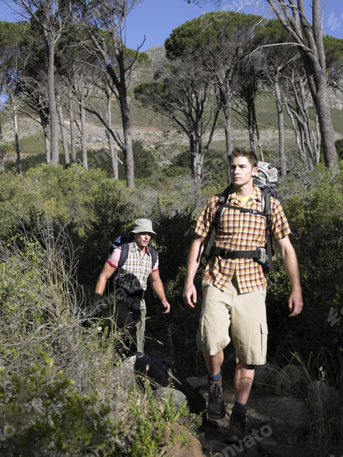Preview: Two Young Men Hiking In The Forest