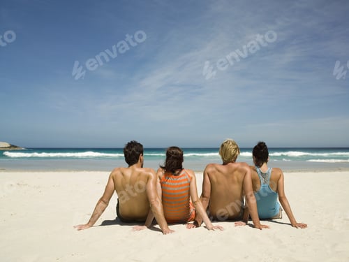 Preview: Couples Sitting On The Beach.