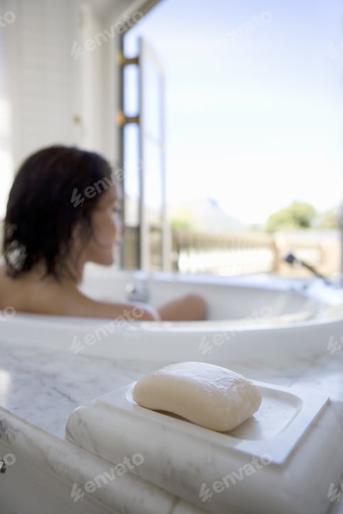 Preview: Young Woman In Bath, Rear View, Soap In Foreground
