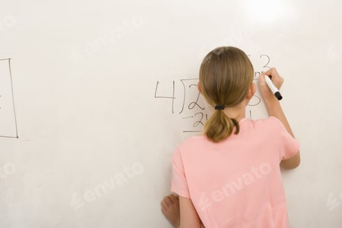 Preview: Girl Writing Formula On Whiteboard, Rear View