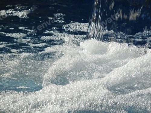 Preview: Close Up Of Water Splashing Into Swimming Pool