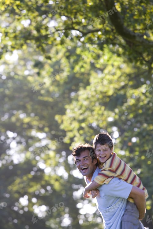 Preview: Father Carrying Son On Back