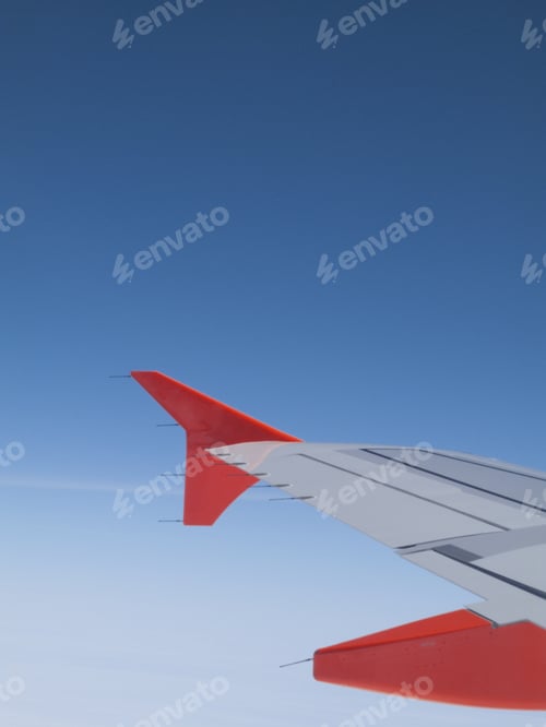 Preview: Airplane Wing In Sky Above Clouds