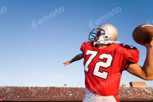 Preview: American Football Quarterback In Stadium Throwing Ball