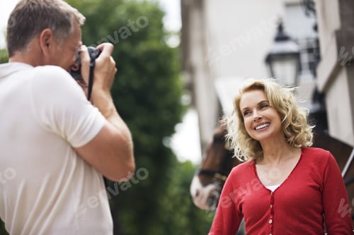 Preview: A Middle-Aged Man Taking A Photograph Of His Partner In Front Of Horse Guards