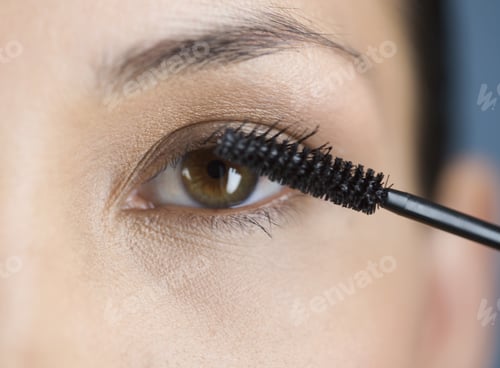 Preview: A Young Woman Applying Mascara