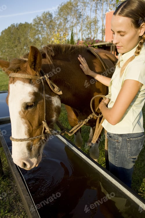 Preview: Woman With Horse Drinking Water