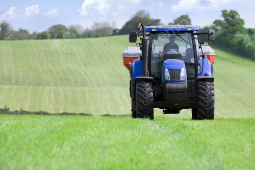 Preview: Tractor And Fertilizer Spreader In Field
