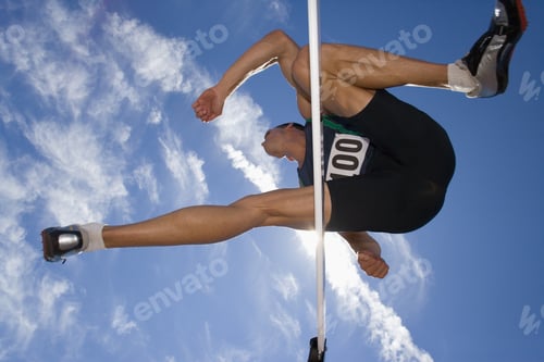 Preview: Male Athlete Jumping Over Hurdle, View From Below