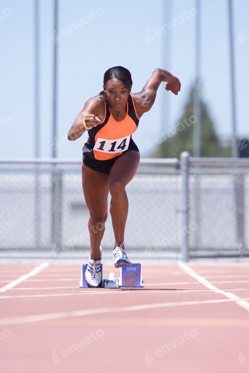 Preview: Female Athlete Leaves Starting Blocks In Sprint Running Race