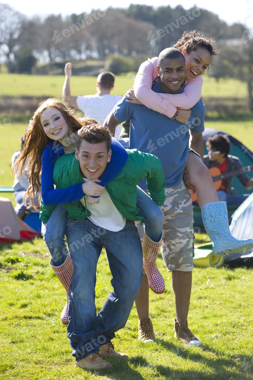 Preview: Couples Piggybacking Near Campsite