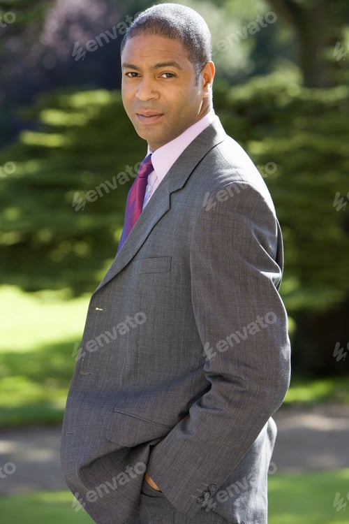 Preview: Businessman With Hands In Pockets Outdoors, Portrait