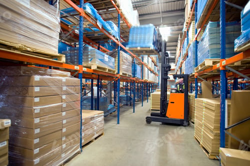 Preview: Distribution Warehouse Worker Moving Boxes On Pallet With Forklift