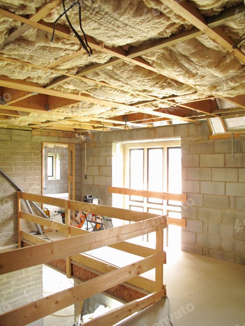 Preview: Unfinished Home Interior with Insulation in the Ceiling