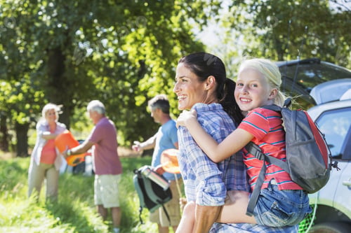 Preview: Multi-Generation Family Unpacking Car On Camping Trip