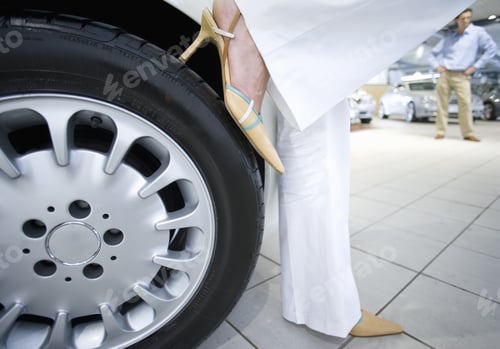 Preview: Woman In High Heels Leaning On New Car