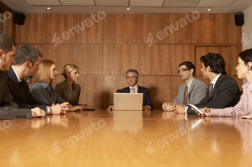 Preview: Group Of Business Executives In A Meeting