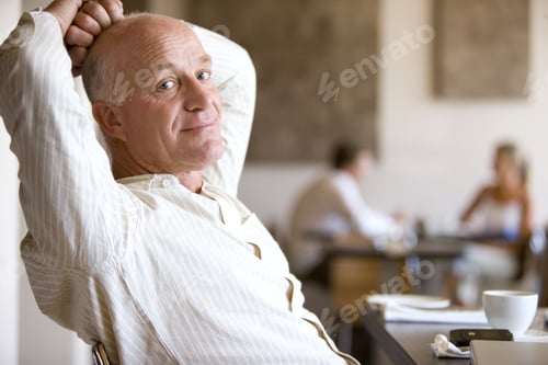 Preview: Man Relaxing In Cafe