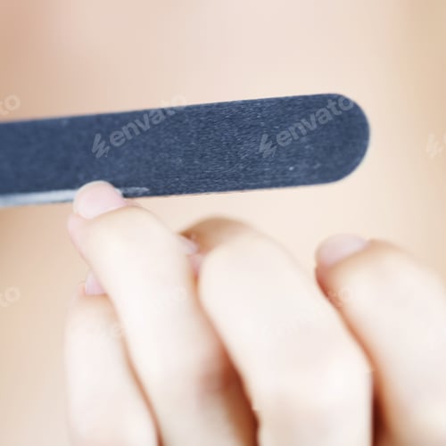 Preview: A Young Woman Filing Her Nails
