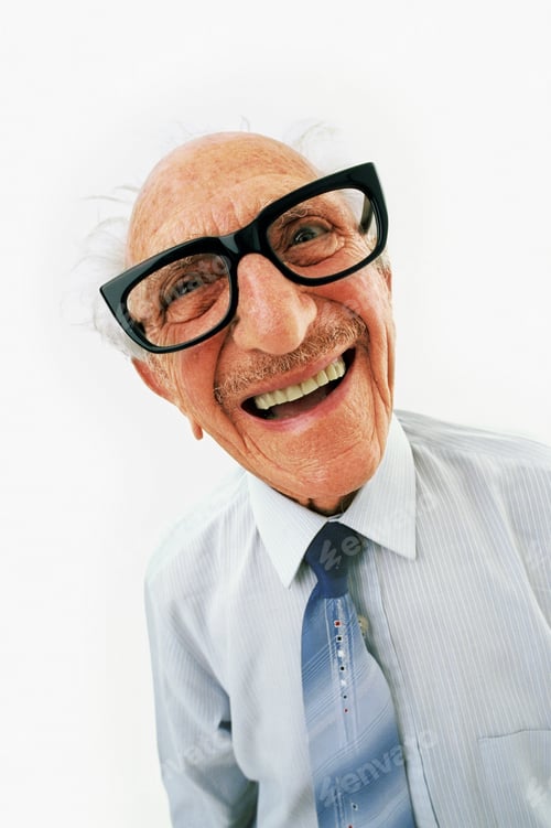 Preview: Funny Studio Of Senior Businessman With Large Glasses Smiling At Camera
