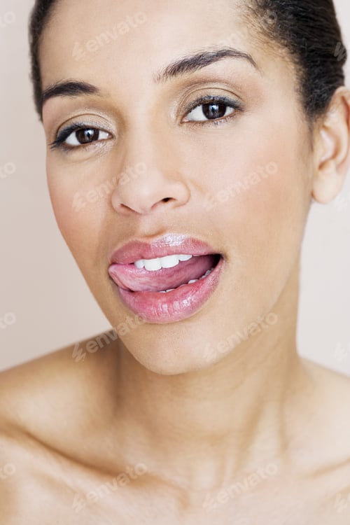 Preview: A Portrait Of A Woman Licking Her Lips