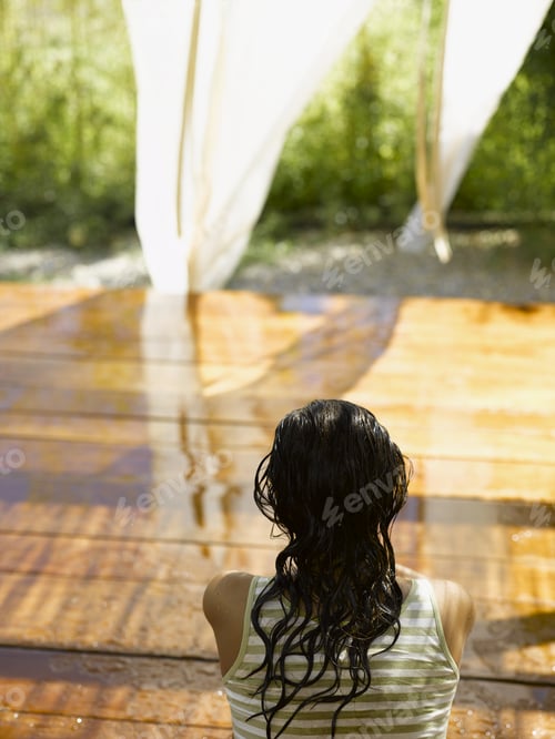 Preview: Rear View Of A Young Woman