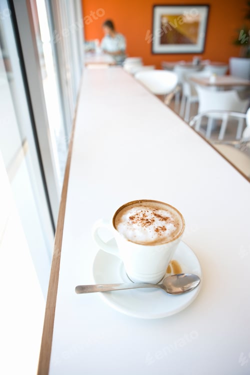 Preview: Cup Of Coffee On Counter In Cafe With Customer