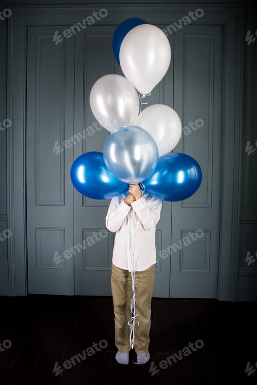 Preview: Boy Hiding Behind A Bunch Of Balloons