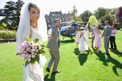Preview: Groom Leading Bride Towards Helicopter On Wedding Day