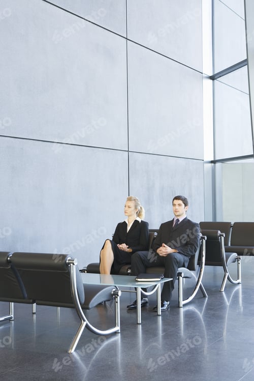 Preview: Two Job Candidates Sitting In A Waiting Room