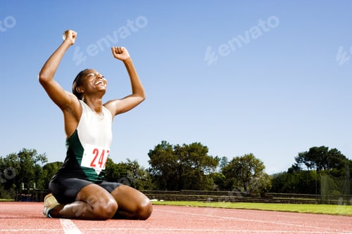 Preview: Portrait Of A Female Athlete Celebrating Her Win
