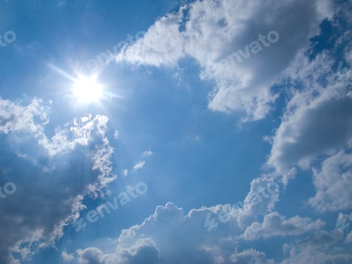 Preview: Sun Shining In Blue Sky With Clouds On Summer Day