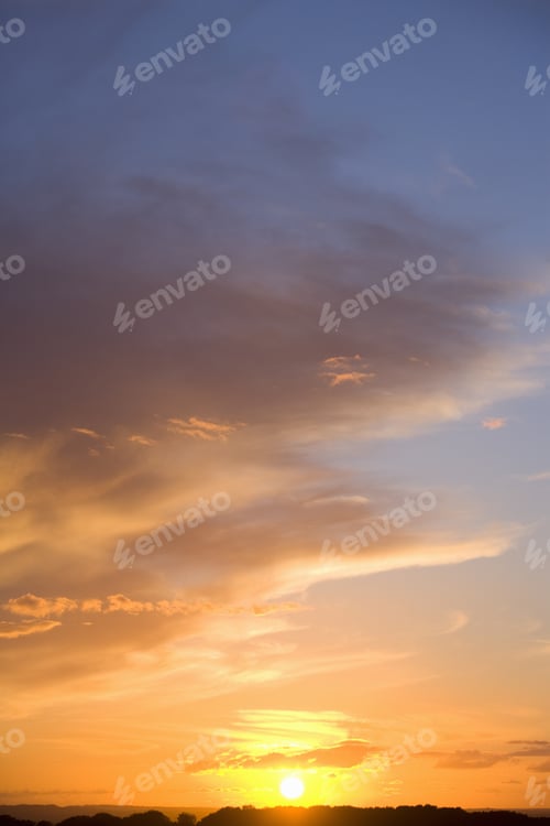 Preview: Sun Setting In Sky With Clouds