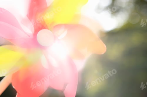 Preview: Abstract View Of Toy Windmill Outdoors