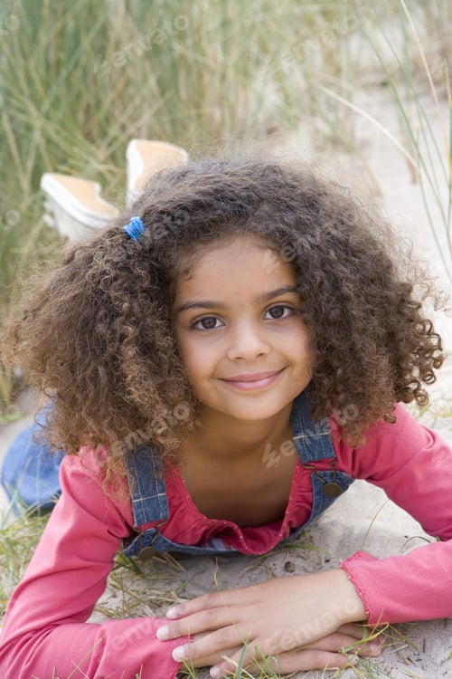 Preview: Portrait Of Girl Lying On Beach