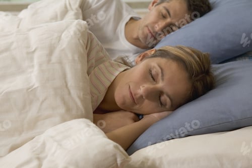 Preview: Couple Asleep Together