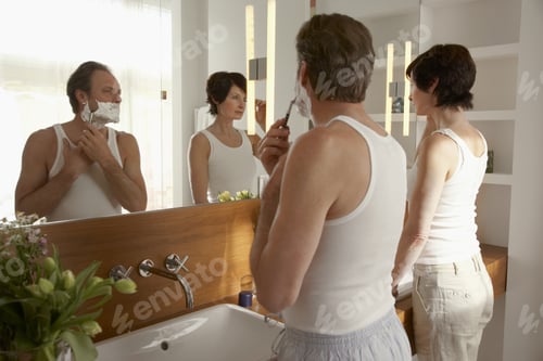 Couple Shaving in Peaceful Bathroom at Home