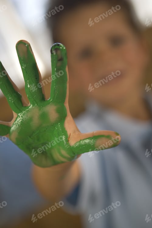 Preview: Close-Up Of A Boy'S Hand With Green Paint On It