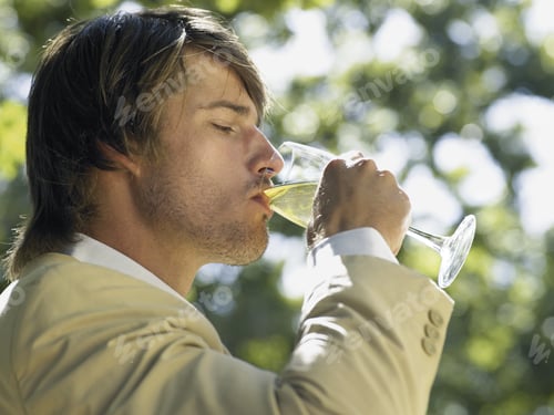 Preview: Man Drinking White Wine.