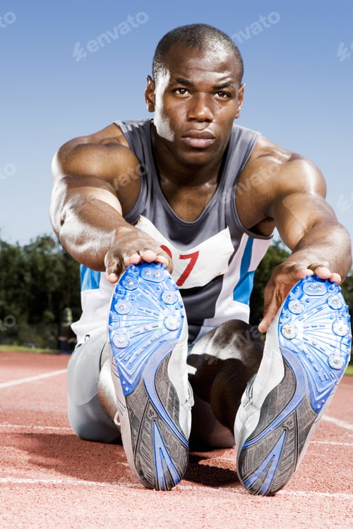 Preview: Portrait Of A Male Athlete Stretching In A Warm Up