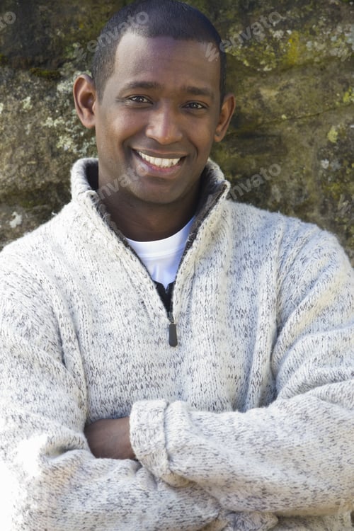 Preview: Smiling Man In Sweater With Arms Crossed