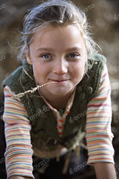 Preview: Girl With Piece Of Straw In Mouth, Smiling, Close-Up, Front View, Portrait