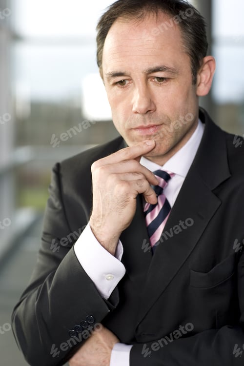 Preview: Businessman Deep In Thought