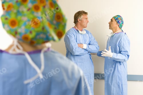 Preview: Surgeon By Colleagues In Conversation, Rear View